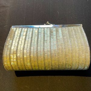 Gorgeous beaded evening bag adorned w bugle beads and chain strap.